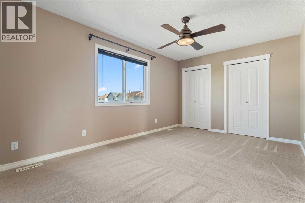 40 Cimarron Grove Drive, Okotoks, Alberta  T1S 2H1 - Photo 25 - A2328196