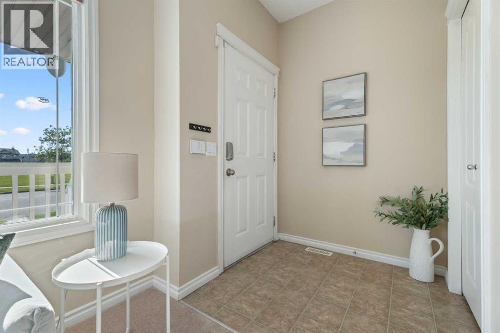 40 Cimarron Grove Drive, Okotoks, Alberta  T1S 2H1 - Photo 7 - A2328196