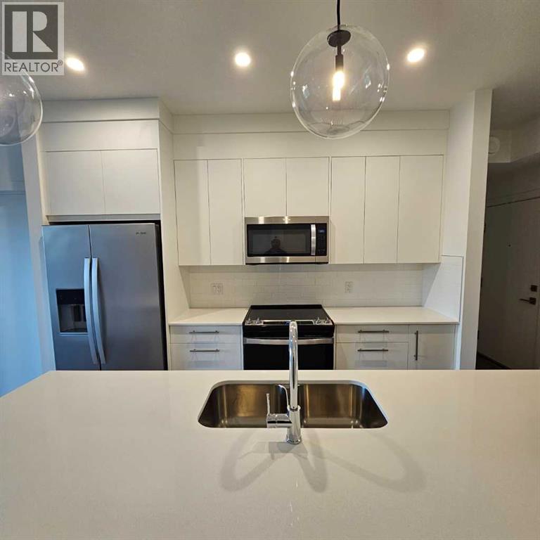 265 Wolf Willow Blvd Boulevard SE, Calgary, Alberta  T2X 6R2 - Photo 4 - A2335112