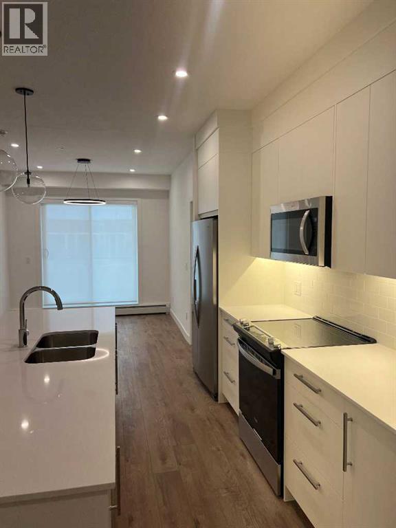 265 Wolf Willow Blvd Boulevard SE, Calgary, Alberta  T2X 6R2 - Photo 7 - A2335112