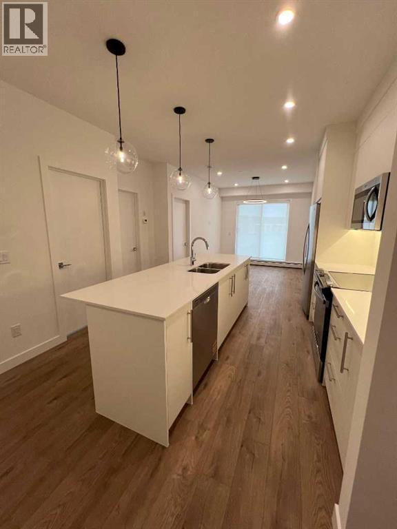265 Wolf Willow Blvd Boulevard SE, Calgary, Alberta  T2X 6R2 - Photo 9 - A2335112