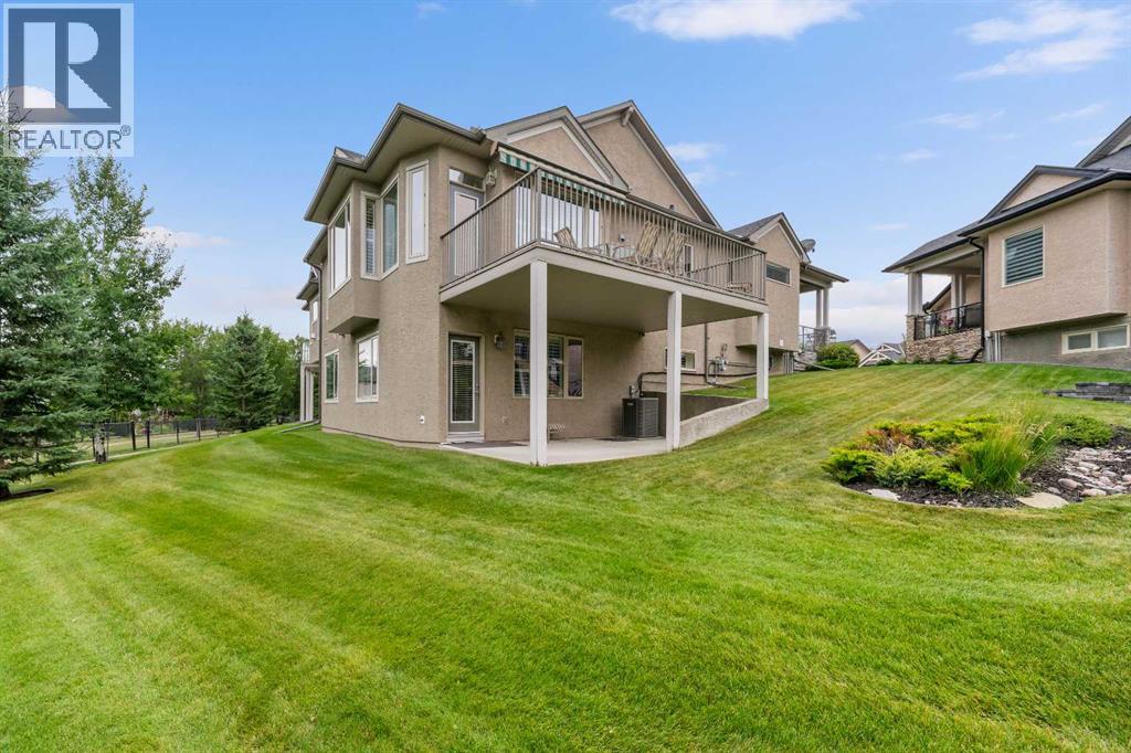 66 Evercreek Bluffs View SW, Calgary, Alberta  T2Y 4V6 - Photo 40 - A2334749