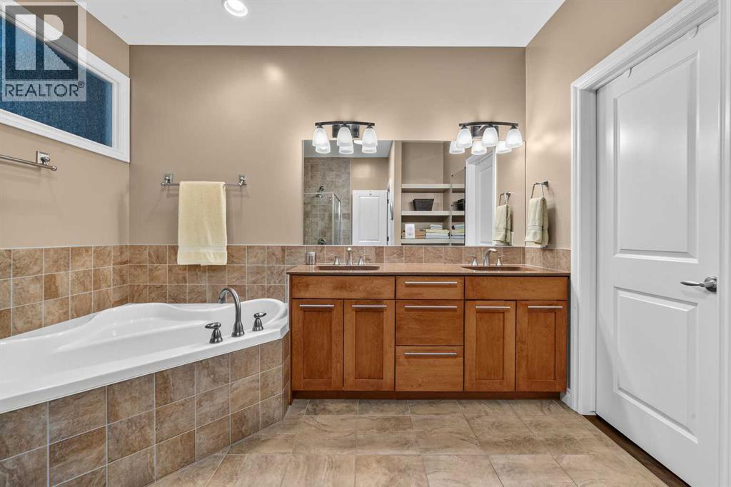 66 Evercreek Bluffs View SW, Calgary, Alberta  T2Y 4V6 - Photo 25 - A2334749