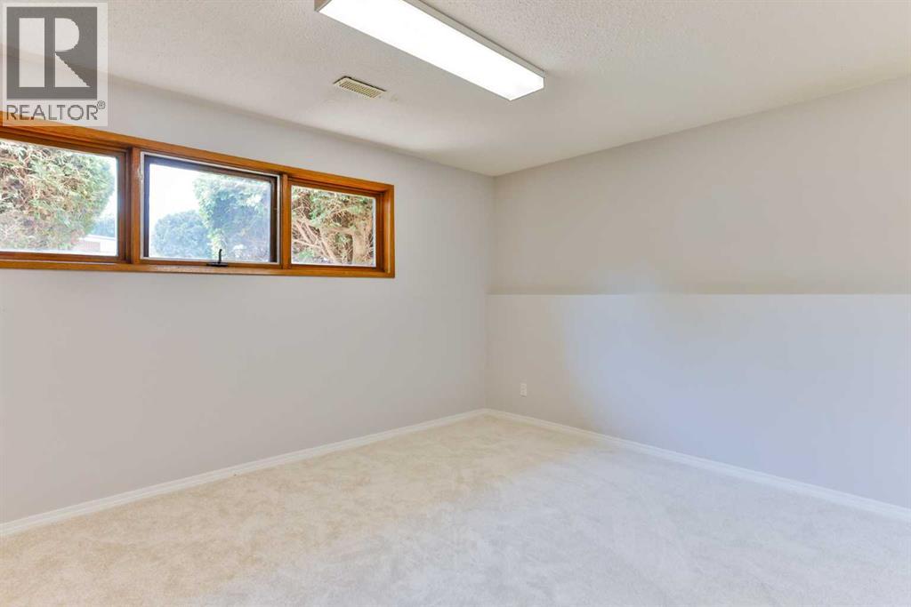 309 Normandy Road S, Lethbridge, Alberta  T1J 3X9 - Photo 18 - A2333049