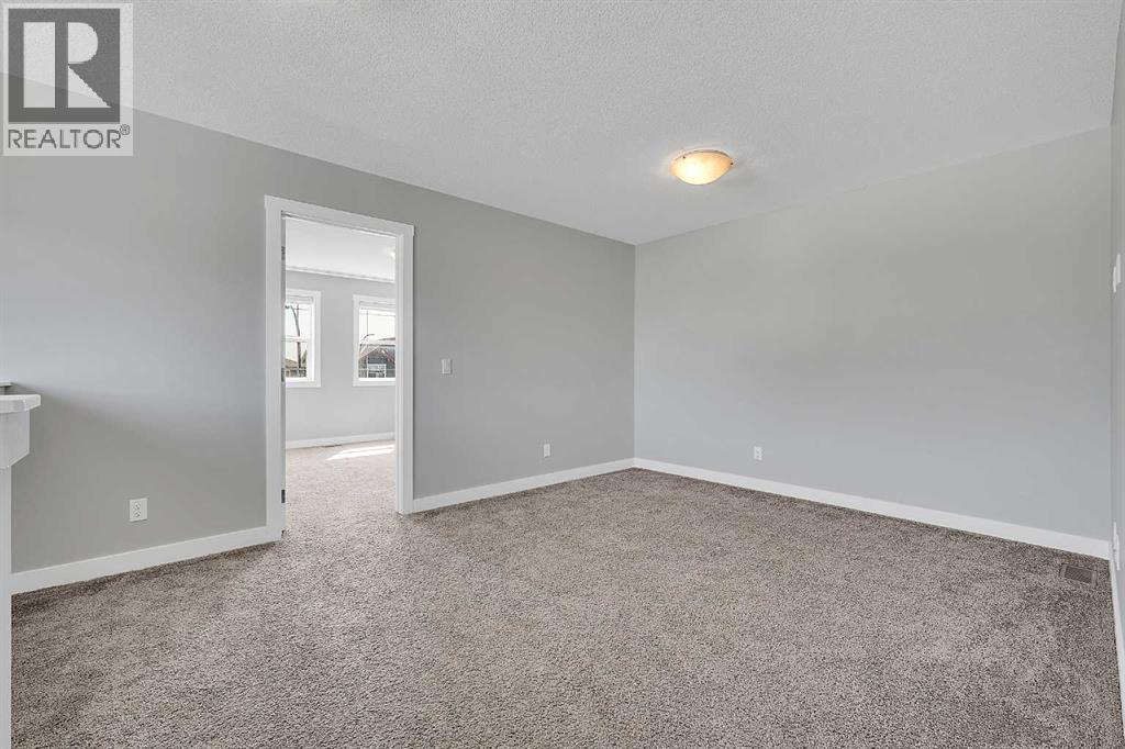 125 Edith Gate Nw, Calgary, Alberta  T3R 1Z2 - Photo 13 - A2321455