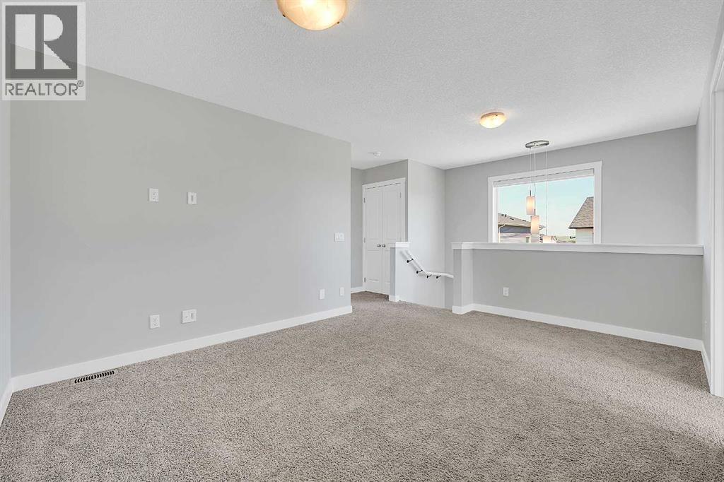 125 Edith Gate Nw, Calgary, Alberta  T3R 1Z2 - Photo 12 - A2321455