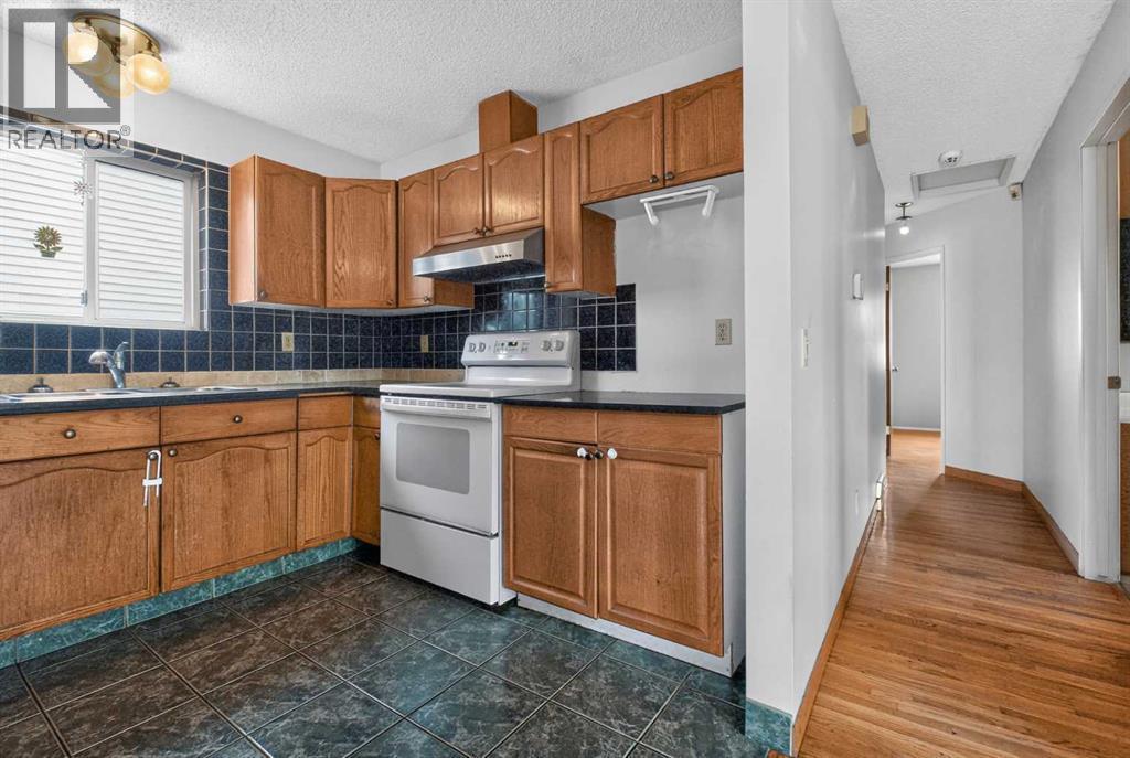 68 Erin Park Drive Se, Calgary, Alberta  T2B 2Z9 - Photo 6 - A2335489