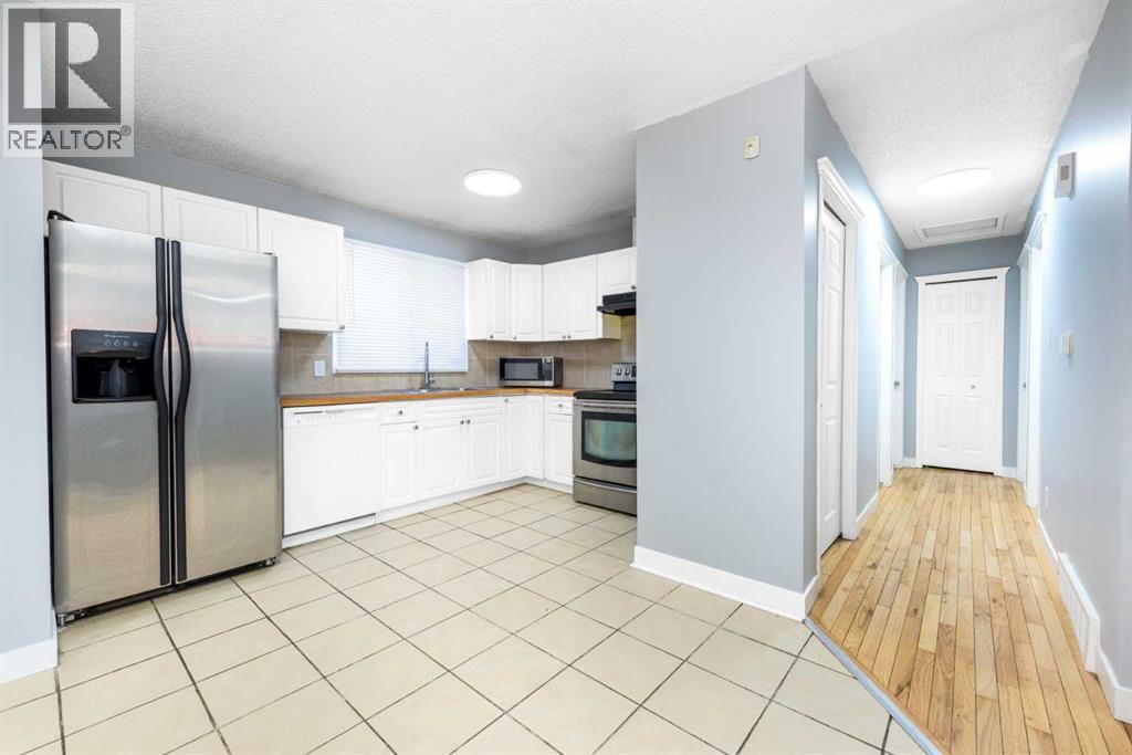 5071 Whitestone Way Ne, Calgary, Alberta T1Y 1T2 - Photo 5 - A2335978