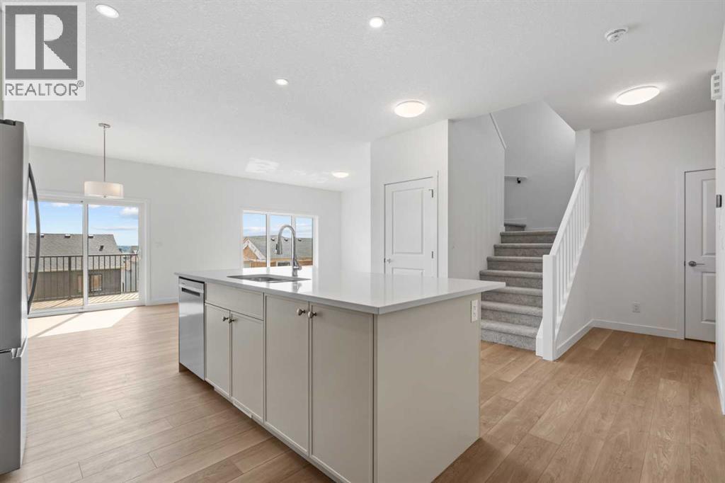 34 Wild Rose Bay Sw, Airdrie, Alberta  T4B 5X8 - Photo 4 - A2334976
