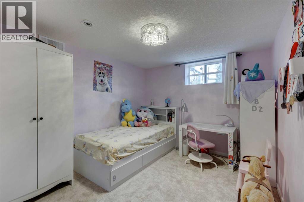 212 Hendon Drive NW, Calgary, Alberta  T2K 1Z2 - Photo 23 - A2327802