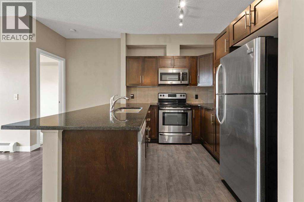 207, 48 Panatella Road NW, Calgary, Alberta  T3K 0V4 - Photo 12 - A2319722