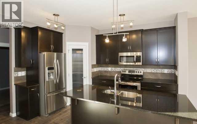 1548 Coalbanks Boulevard W, Lethbridge, Alberta  T1J 5H7 - Photo 5 - A2330452