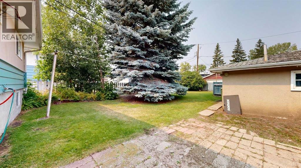 708 55 Avenue, Calgary, Alberta  T2V 0G3 - Photo 28 - A2335557