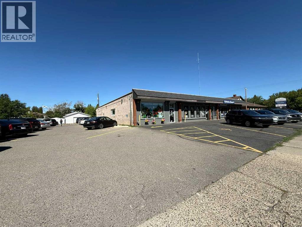 1014, 1020, 1022, 1024 20 Street S, Lethbridge, Alberta  T1K 3W2 - Photo 2 - A2328147