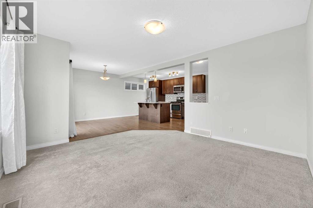 99 Buckskin Way, Cochrane, Alberta  T4C 2P2 - Photo 7 - A2312754