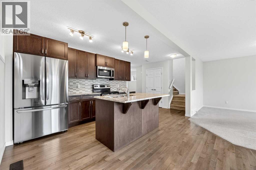 99 Buckskin Way, Cochrane, Alberta  T4C 2P2 - Photo 2 - A2312754