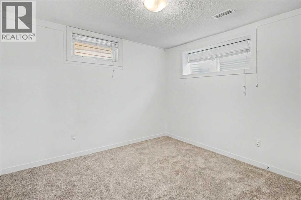 18 Collingwood Place Nw, Calgary, Alberta  T2L 0P9 - Photo 26 - A2335323