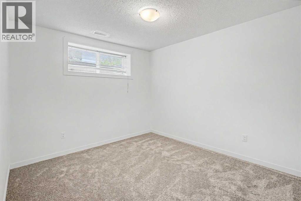 18 Collingwood Place Nw, Calgary, Alberta  T2L 0P9 - Photo 24 - A2335323
