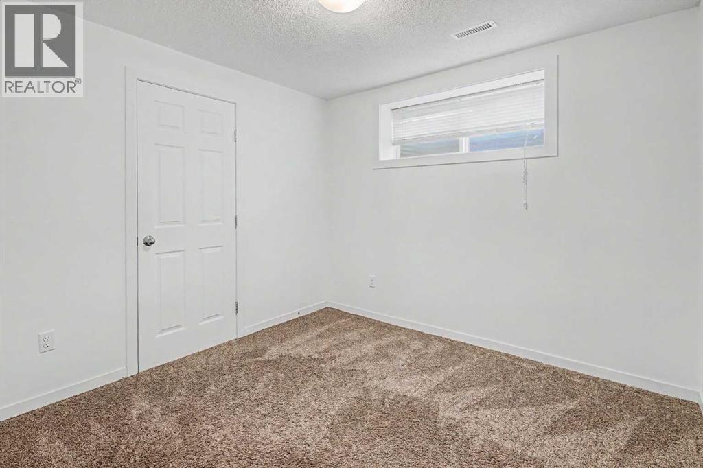 18 Collingwood Place Nw, Calgary, Alberta  T2L 0P9 - Photo 23 - A2335323