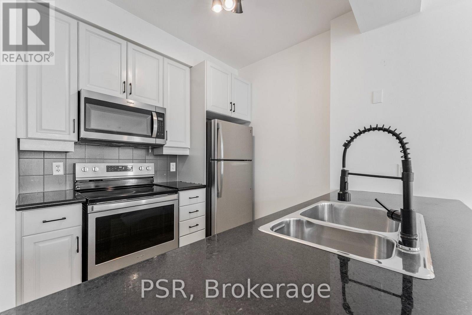 423 - 9 Boardwalk Drive, Toronto, Ontario M4L 6T1 - Photo 1 - E13656876
