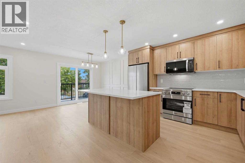 1387 Berkley Drive NW, Calgary, Alberta  T3K 1T5 - Photo 6 - A2336046