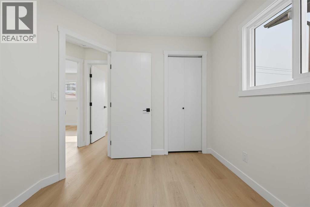 1387 Berkley Drive NW, Calgary, Alberta  T3K 1T5 - Photo 30 - A2336046