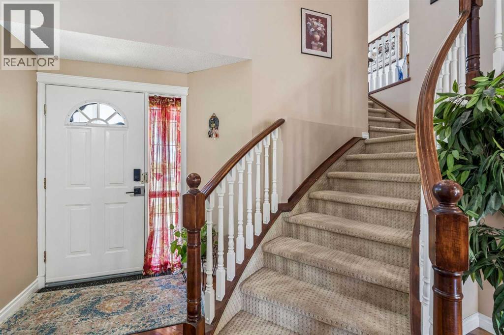 86 Tuscany Ravine Road NW, Calgary, Alberta  T3L 2R9 - Photo 4 - A2323292