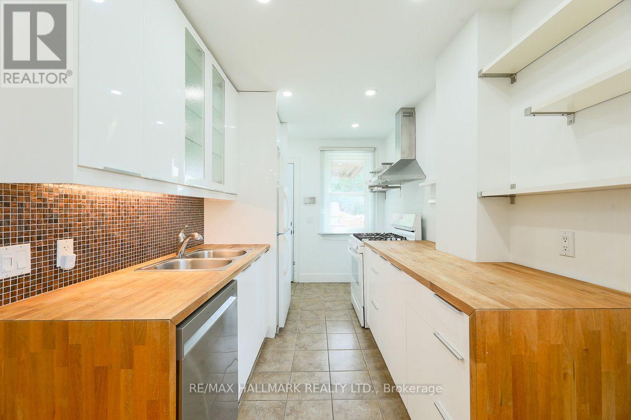 Main - 2159 Gerrard Street E, Toronto, Ontario  M4E 2C4 - Photo 2 - E13658104