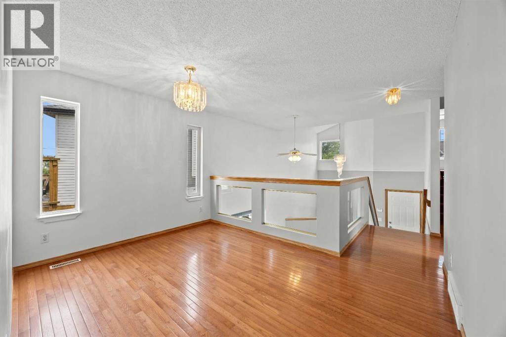 117 Hidden Spring Circle Nw, Calgary, Alberta  T3A 5H4 - Photo 6 - A2334324