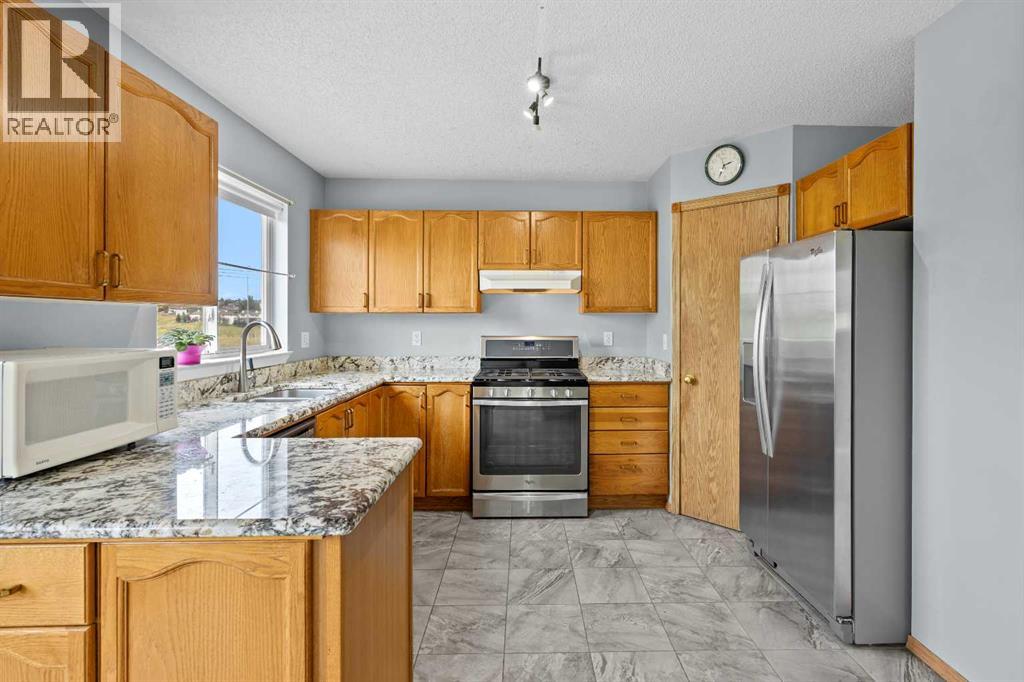117 Hidden Spring Circle Nw, Calgary, Alberta  T3A 5H4 - Photo 7 - A2334324