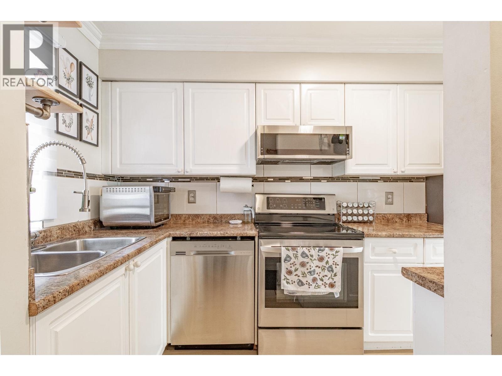 107 1570 Prairie Avenue, Port Coquitlam, British Columbia  V3B 1T4 - Photo 1 - R3154113