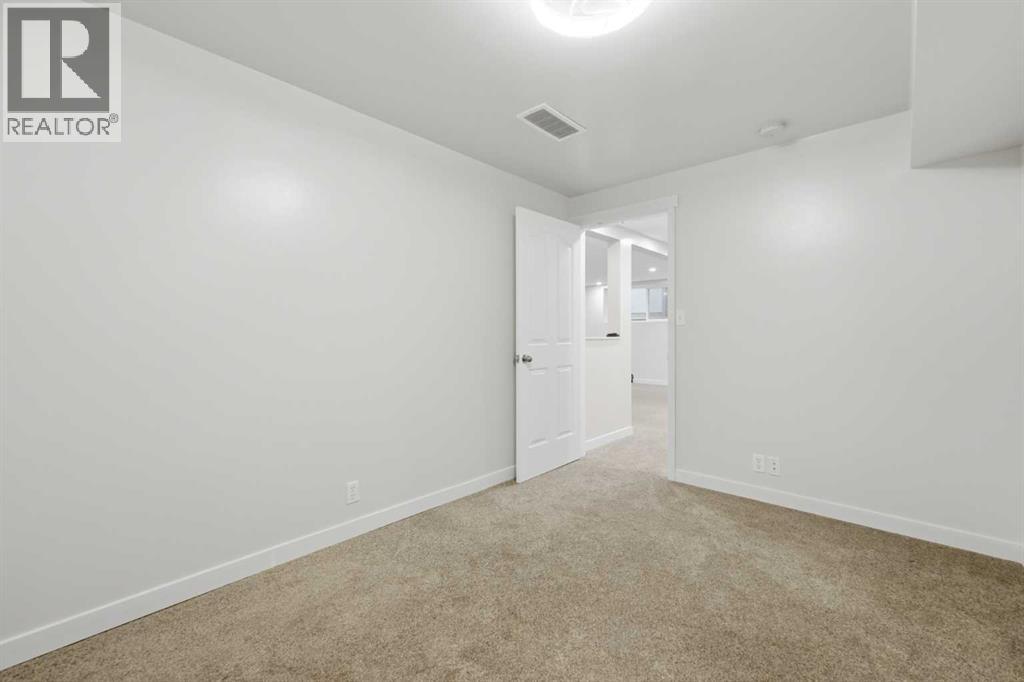 206 Highwood Village Place NW, High River, Alberta  T1V 1V9 - Photo 34 - A2315926