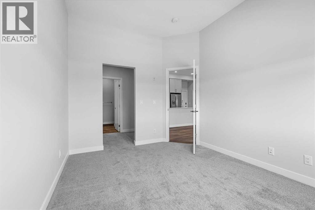 406, 255 Les Jardins Park SE, Calgary, Alberta  T2C 5W9 - Photo 8 - A2316218