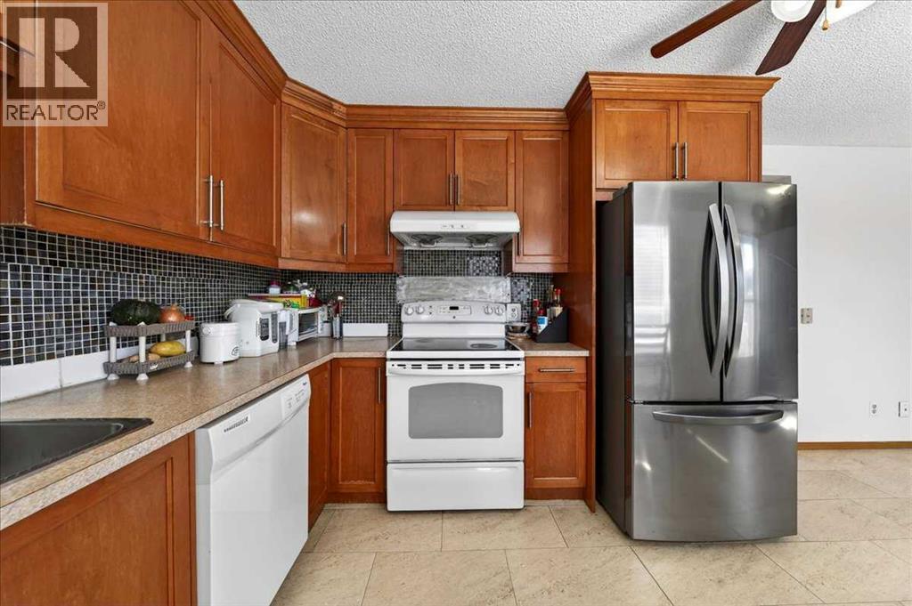 124 Martinwood Court NE, Calgary, Alberta  T3J 3H2 - Photo 10 - A2309394