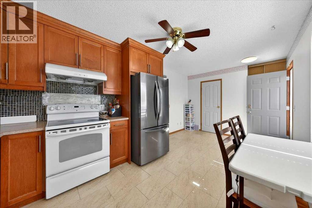 124 Martinwood Court NE, Calgary, Alberta  T3J 3H2 - Photo 9 - A2309394
