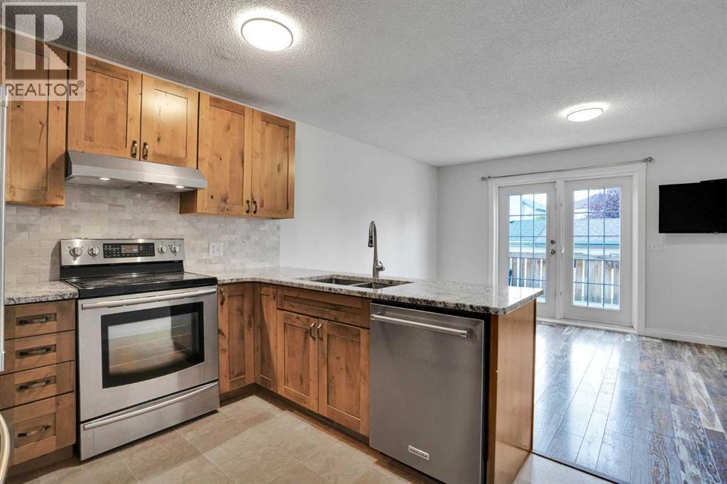 7152 Sierra Morena Boulevard SW, Calgary, Alberta  T3H 3G8 - Photo 13 - A2330808