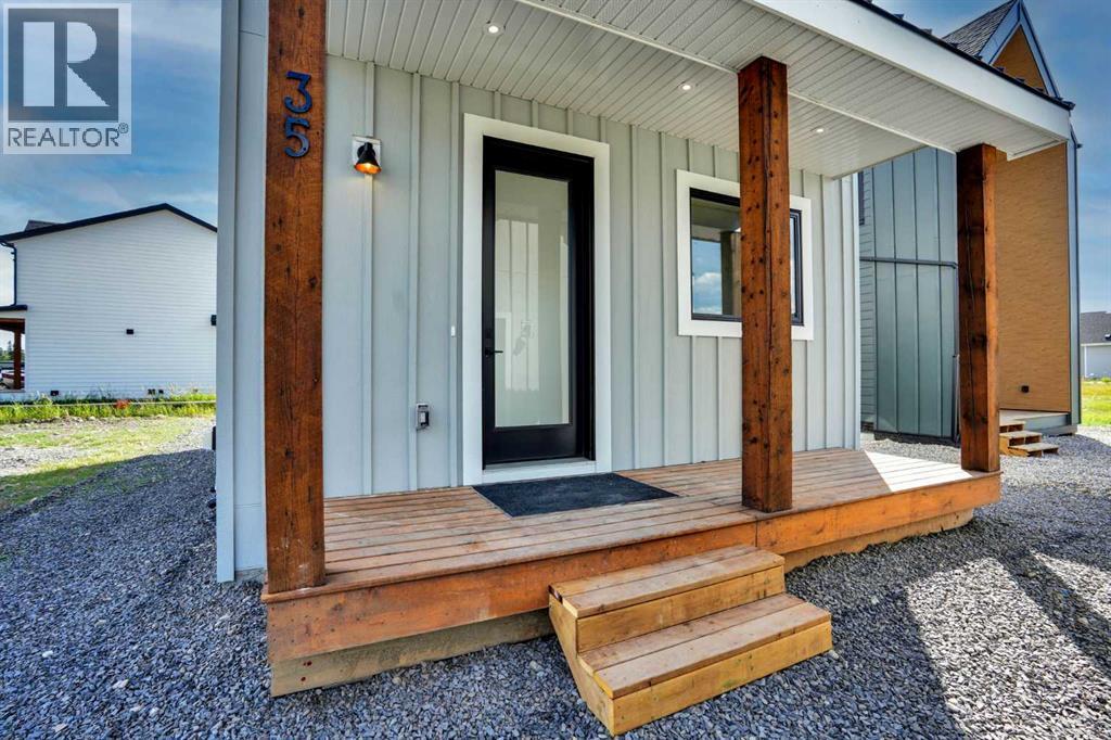 35 Cottageclub Lane, Rural Rocky View County, Alberta  T0L 1N0 - Photo 2 - A2332770