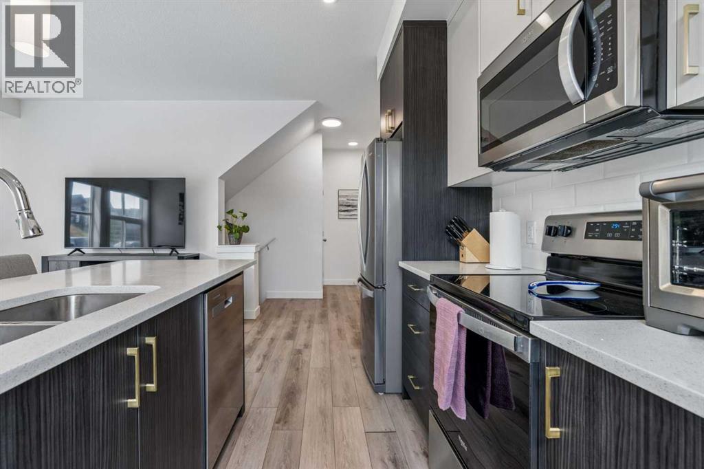 103 Spring Creek Common SW, Calgary, Alberta  T3H 6E2 - Photo 6 - A2334087