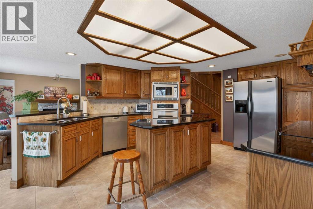 935 Shawnee Drive SW, Calgary, Alberta  T2Y 2G9 - Photo 10 - A2314560
