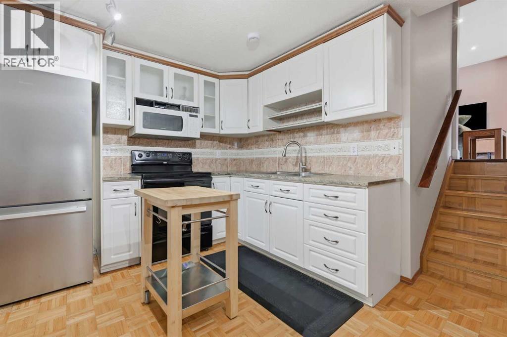 163 Macewan Meadow Way NW, Calgary, Alberta  T3K 3J1 - Photo 33 - A2327849