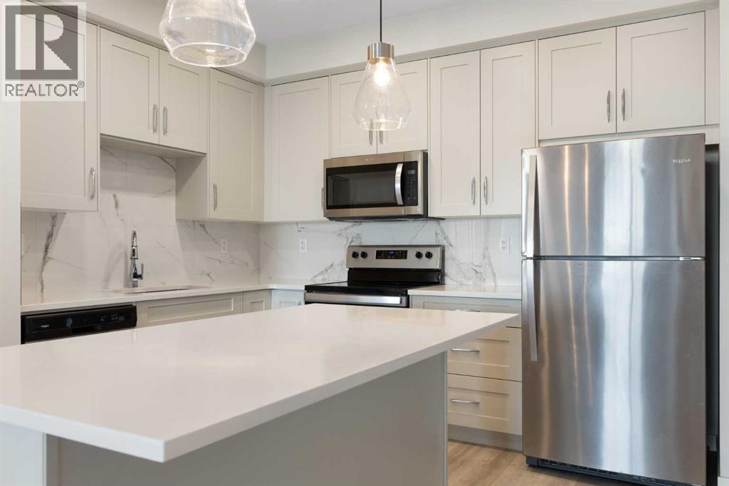 202, 150 Shawnee Square SW, Calgary, Alberta  T2Y 0T6 - Photo 3 - A2334729