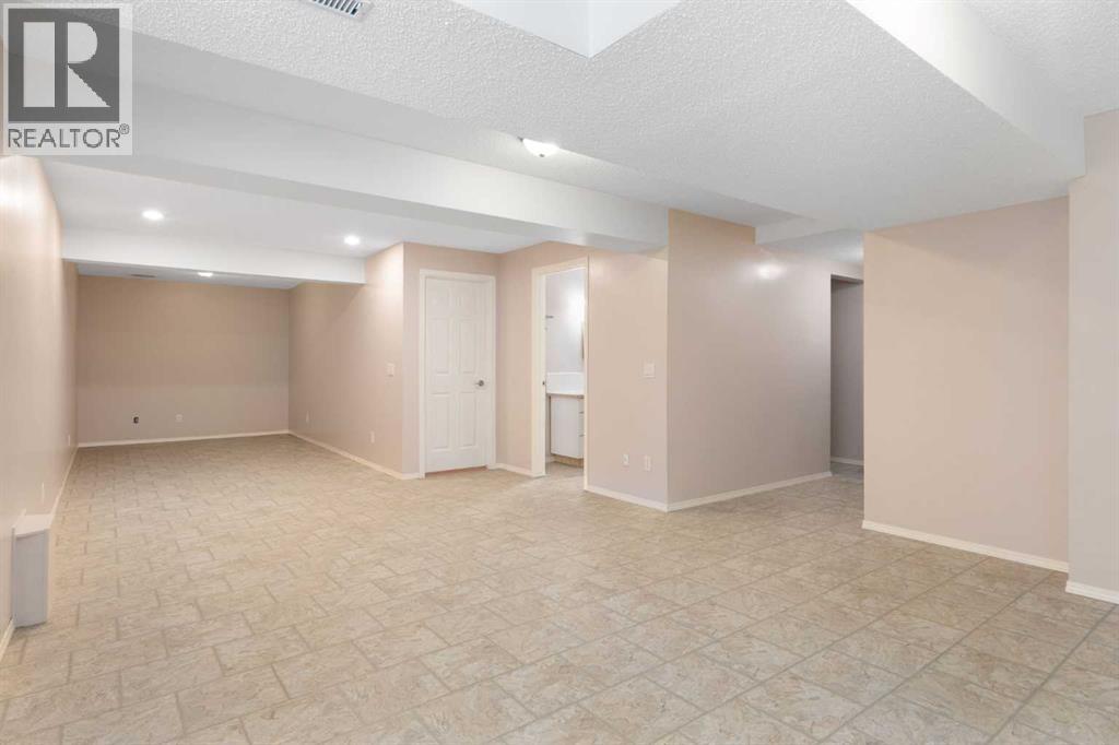 77 Tararidge Circle Ne, Calgary, Alberta  T3J 3W4 - Photo 19 - A2334497