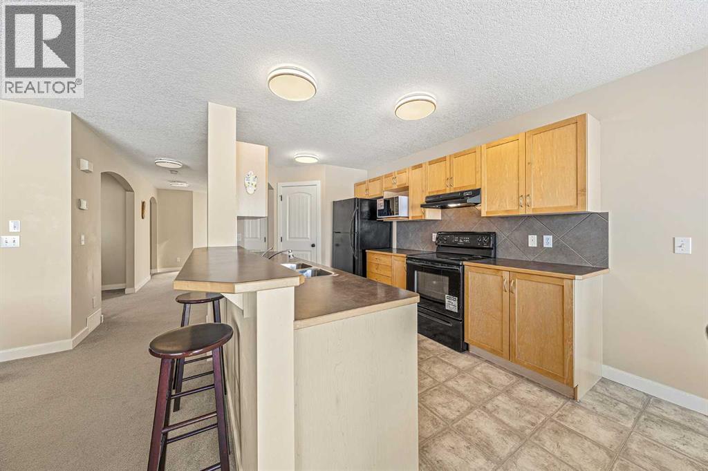 91 Bridlecrest Street SW, Calgary, Alberta  T2Y 4Y8 - Photo 9 - A2324159
