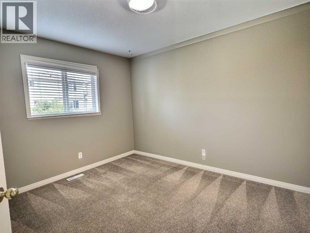 185 Tuscarora Close Nw, Calgary, Alberta  T3L 2E3 - Photo 27 - A2330549