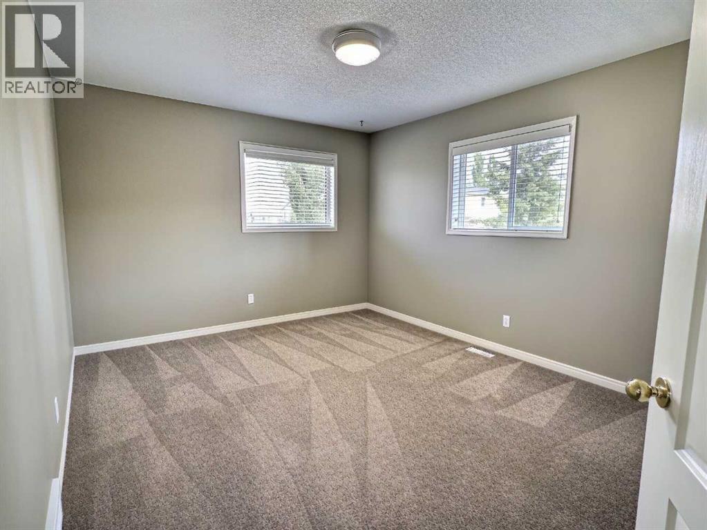 185 Tuscarora Close Nw, Calgary, Alberta  T3L 2E3 - Photo 29 - A2330549