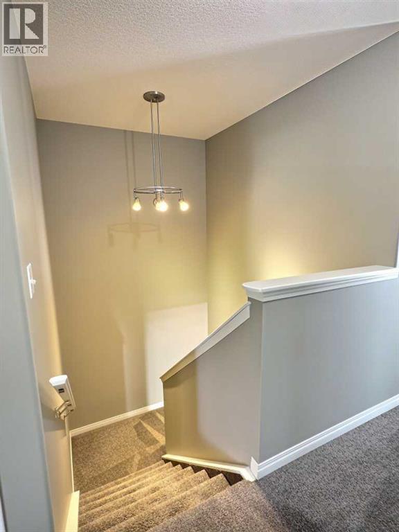 185 Tuscarora Close Nw, Calgary, Alberta  T3L 2E3 - Photo 21 - A2330549