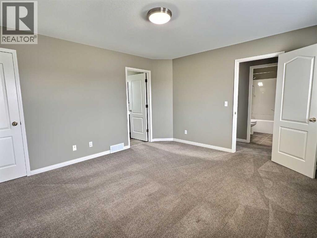185 Tuscarora Close Nw, Calgary, Alberta  T3L 2E3 - Photo 23 - A2330549