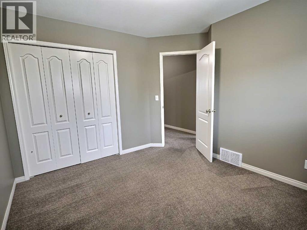 185 Tuscarora Close Nw, Calgary, Alberta  T3L 2E3 - Photo 26 - A2330549