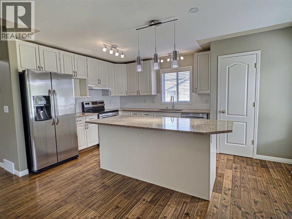 185 Tuscarora Close Nw, Calgary, Alberta  T3L 2E3 - Photo 11 - A2330549