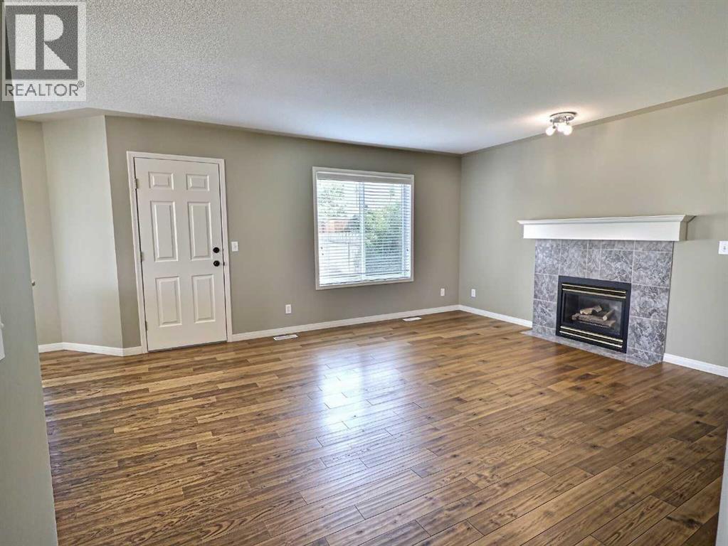 185 Tuscarora Close Nw, Calgary, Alberta  T3L 2E3 - Photo 9 - A2330549